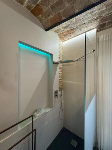 a shower with a glass door in a bathroom at Boutique Room Santa Maria by Il Timbro in Vasto