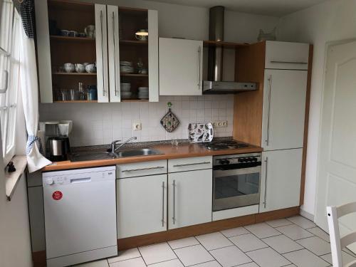 Η κουζίνα ή μικρή κουζίνα στο Ferienwohnung Rohwer