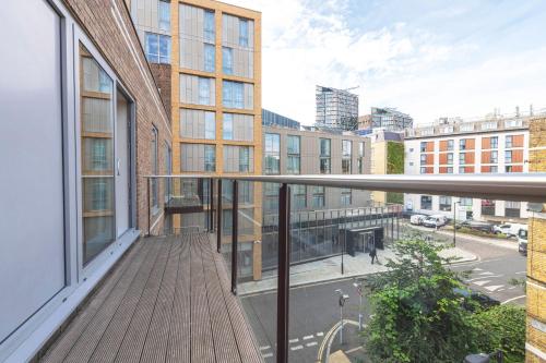 an apartment balcony with a view of a street at Spacious & Elegant Apartments in Southbank near London Eye in London