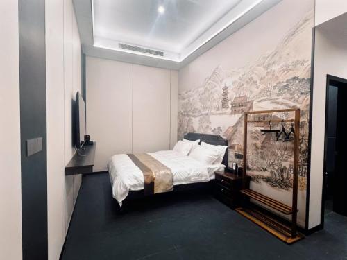 Postel nebo postele na pokoji v ubytování Yongjuxiang Mansion