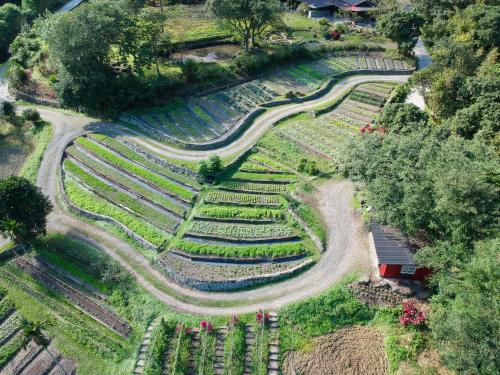 an aerial view of a park with a garden at Tou-Cheng Leisure Farm Hotel in Toucheng