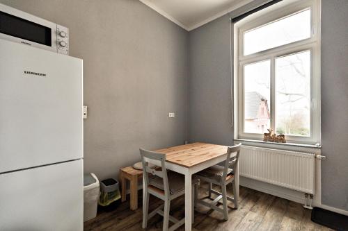 Kuchyň nebo kuchyňský kout v ubytování FeWo Droyßig Villa Edelgard