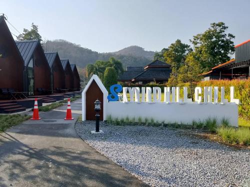 a sign that reads scariulittle city next to a building at Nordic SkyBird Hill Chill in Pak Chong
