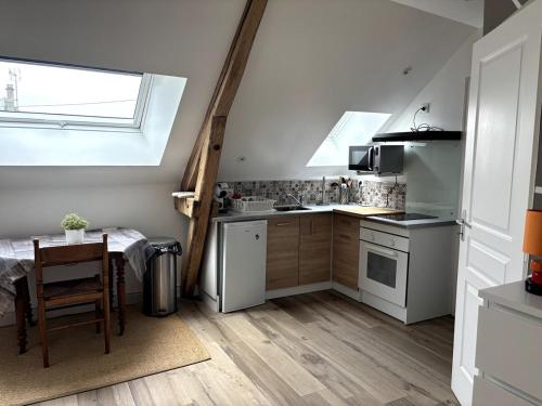 Dapur atau dapur kecil di Appartement avec cour 3