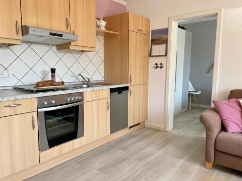 Kuchyň nebo kuchyňský kout v ubytování Ferienwohnung Dünennest
