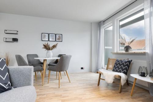 Posezení v ubytování Appartement Nele Kieler Straße 16a APPARTO Grömitz