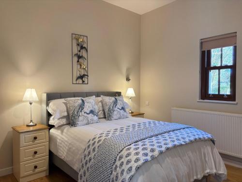 Postel nebo postele na pokoji v ubytování Cottage 474 - Kylemore