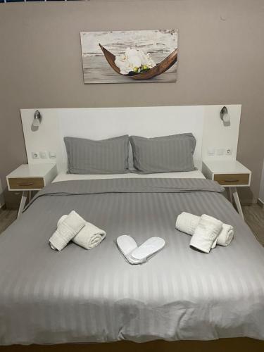 Ένα ή περισσότερα κρεβάτια σε δωμάτιο στο SUNIBELROOMS