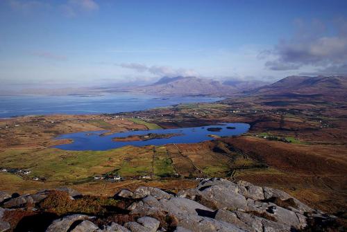 an aerial view of two lakes on a mountain at Cottage 483 - Renvyle in Letterfrack