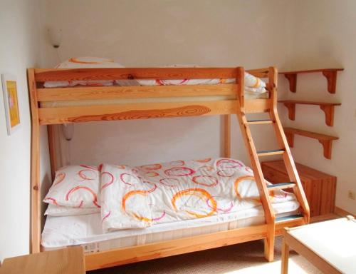 Katil atau katil-katil dalam bilik di Ferienhaus am Plauer See