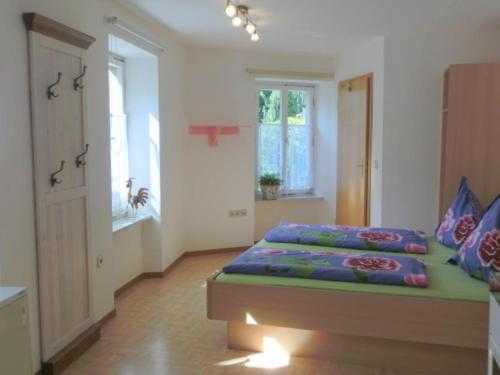 Ένα ή περισσότερα κρεβάτια σε δωμάτιο στο Ferienhaus Berkele für 8 bis 12 Personen