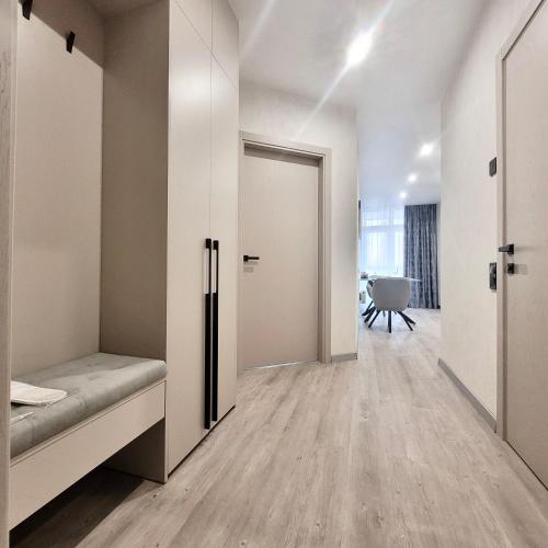 an empty room with a door leading into a room at ApartPoltava Перлина біля Мюнхена РЕМОНТ 2025 in Poltava