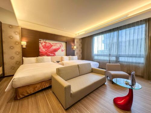 Postel nebo postele na pokoji v ubytování Norway Forest Tamsui Motel