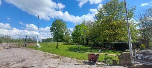 a view of a park with a basketball hoop at Vergroening in IJzendijke