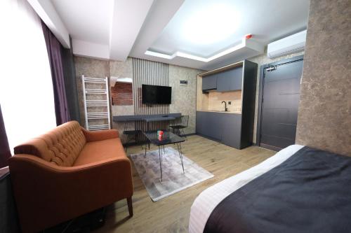 Televisyen dan/atau pusat hiburan di Nomad Hub Istanbul Suit