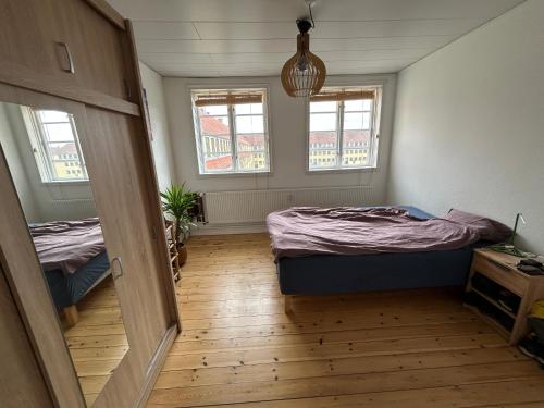Ένα ή περισσότερα κρεβάτια σε δωμάτιο στο Apartment in hip Nordvest area