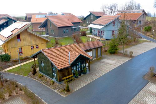 an overhead view of a house in a residential neighborhood at Ferienhaus Nr 11B2, Feriendorf Hagbügerl, Bayr Wald in Waldmünchen