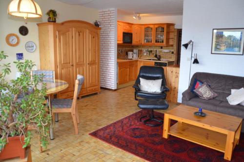 Køkken eller tekøkken på FeWo Sandrock Nr31 Solmare