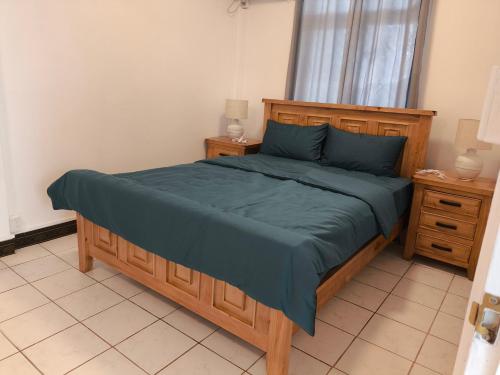 Postel nebo postele na pokoji v ubytování Paradise Inn