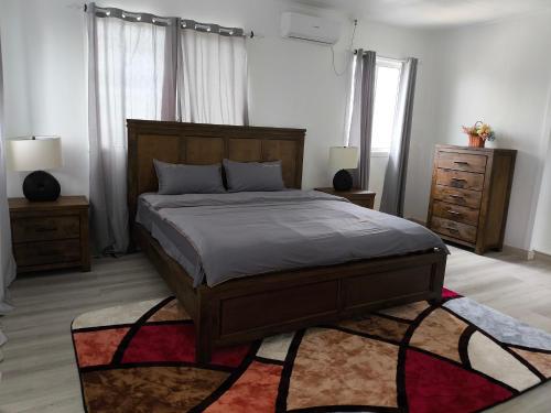 Postel nebo postele na pokoji v ubytování Paradise Inn