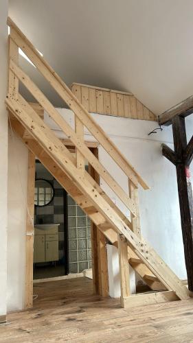 a wooden staircase in a house under construction at private house in Ústí nad Labem