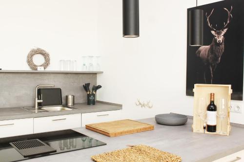 TV a/nebo společenská místnost v ubytování Ferienwohnung HeiDi Lux 1