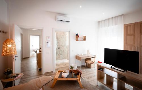 TV a/nebo společenská místnost v ubytování Da Filippo B&B