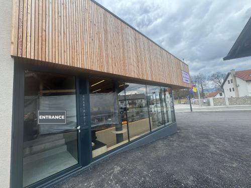 a store front of a building with a sign that reads entrance at Apartments Park Vodice - Ljubljana, Krvavec in Woditz
