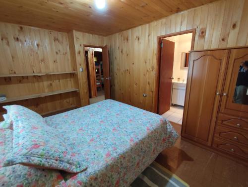 Postel nebo postele na pokoji v ubytování Cabaña Leandro Lago Panguipulli