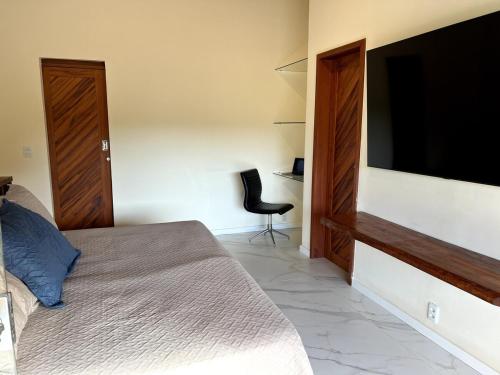 Ένα ή περισσότερα κρεβάτια σε δωμάτιο στο Cobertura de luxo de 3 a 4 quartos, 4 a 5 banos, ate 7 p