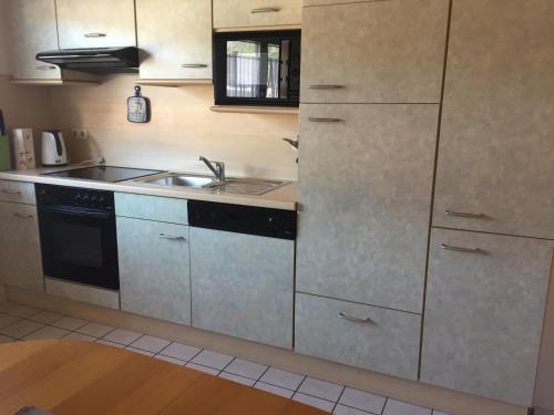 Kuchyň nebo kuchyňský kout v ubytování Haus Rehm