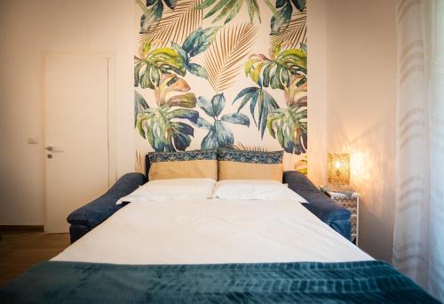 Кровать или кровати в номере Casa Vanitosa 2 camere 2 bagni posto auto medio