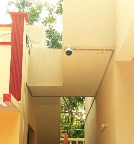 a view of a hallway of a building with a window at Brewvilla 'Solaris ' in Puducherry