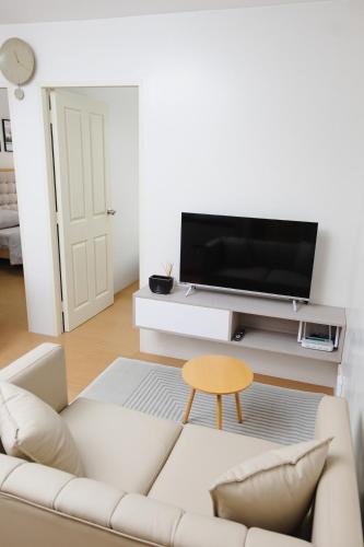 TV a/nebo společenská místnost v ubytování SuiteEscape