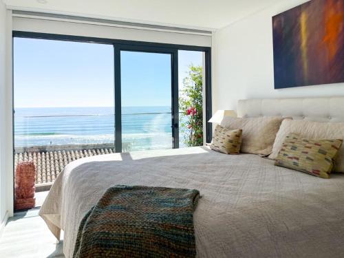 Ένα ή περισσότερα κρεβάτια σε δωμάτιο στο Casa Dourada - Golden Beach Apt