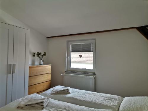 Postel nebo postele na pokoji v ubytování Ferienwohnung Neukalen