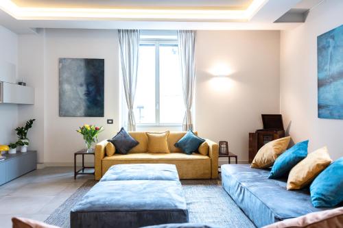 a living room with two couches and a couch at San Carlo Premium - Torino Centro in Turin