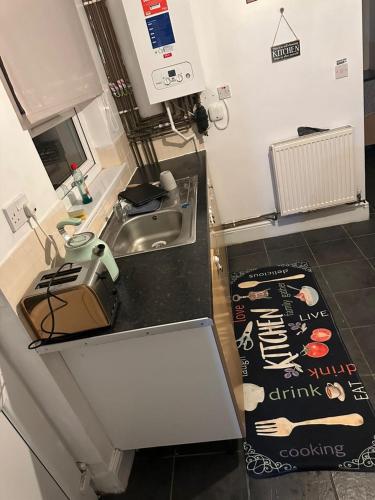 an overhead view of a kitchen with a sink at A Place to stay in Kettering in Kettering