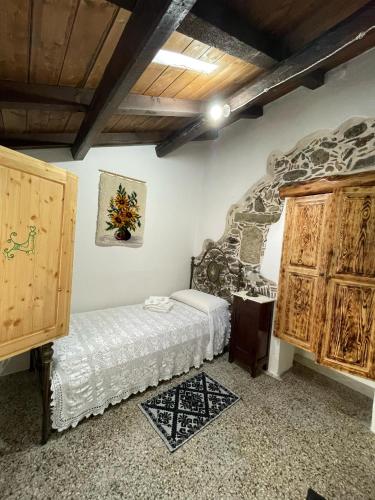 Una cama o camas en una habitación de Casa Murroni