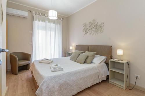 Posteľ alebo postele v izbe v ubytovaní Terrace under Taormina just a few minutes walk to the free beach and downtown!