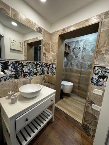 a bathroom with a sink and a shower at Villa Immacolata in Casalabate