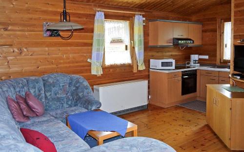 O bucătărie sau chicinetă la Ferienhaus Nr 28, Typ A, Feriendorf Jägerpark, Bayerischer Wald