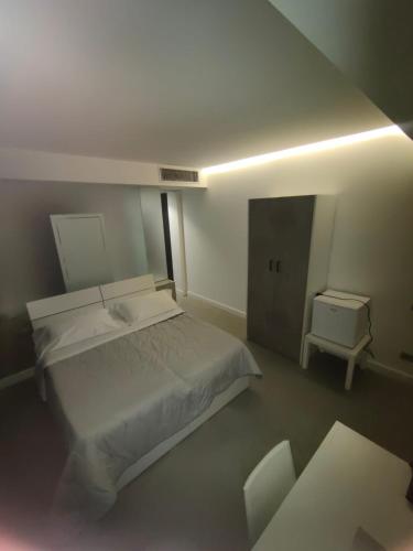Postel nebo postele na pokoji v ubytování HOTEL QUADRIFOGLIO