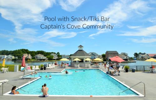 Πισίνα στο ή κοντά στο Beachin' at the Cove - Golf course, Shared pool & more!