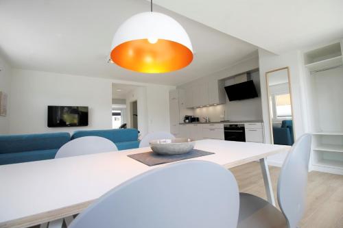 Η κουζίνα ή μικρή κουζίνα στο Haus Barbara - Schwimmbad und Sauna im Haus-Whg 10