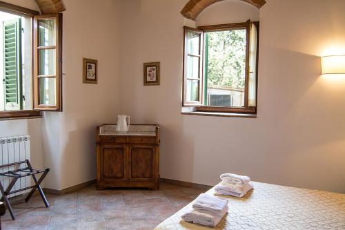 Ένα ή περισσότερα κρεβάτια σε δωμάτιο στο Agriturismo Torraiolo