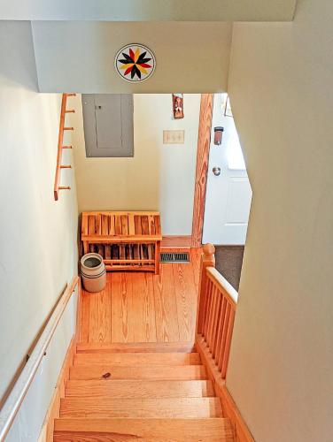 a view of a staircase in a house at Channel Watch - Waterfront home with private Pier! in Deep Hole