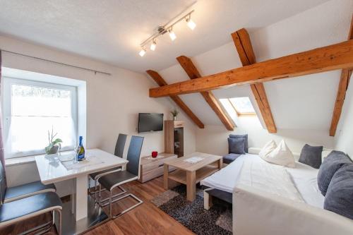 Televízia a/alebo spoločenská miestnosť v ubytovaní Appartement 204