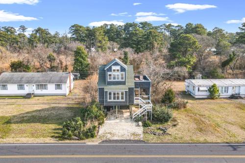 an aerial view of a house and two houses at Cozy Nest - Waterview, Pet Friendly, Screened Porch in Deep Hole