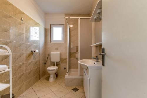 Kúpeľňa v ubytovaní Haus Perkovic
